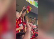 Fan of the lady: Lamin Yamal’s father cheers for Spain and his son in the audience during the semi-final