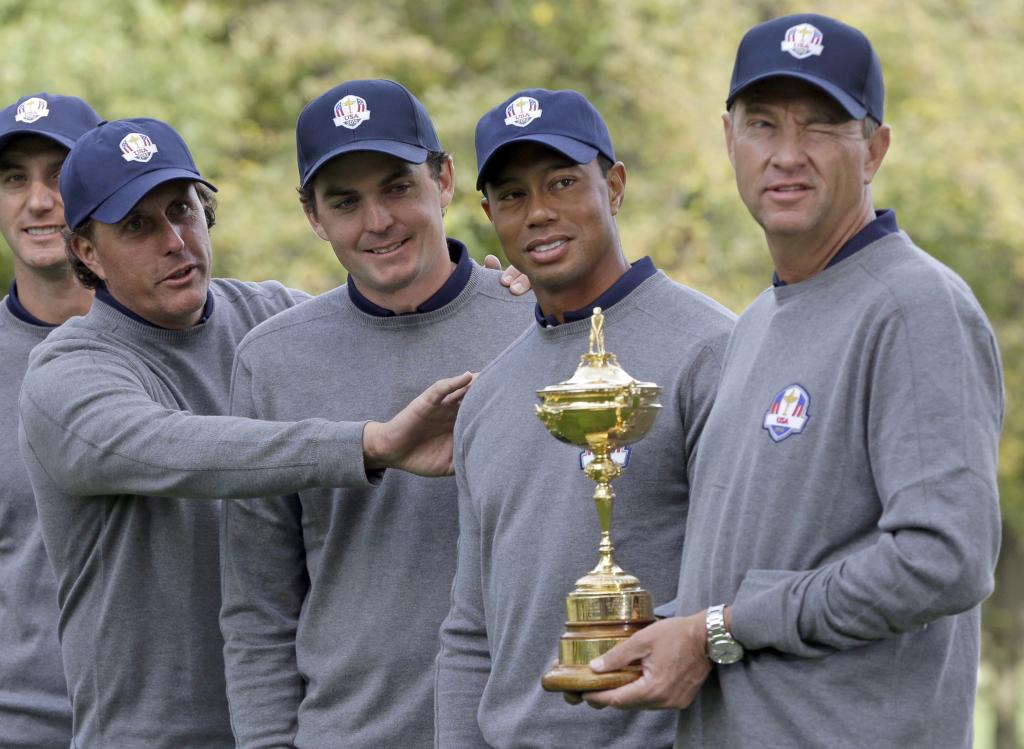 Phil Mickelson, Keegan Bradley, Tiger Woods and captain Davis Love third at the 2012 Ryder Cup