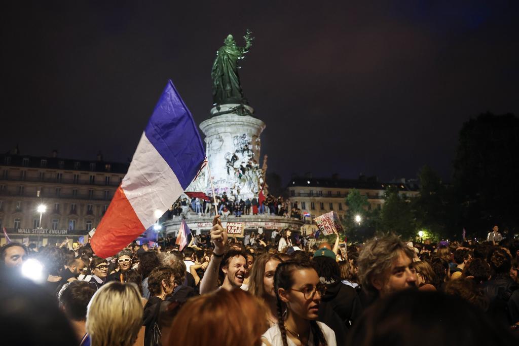 French citizens celebrate the election results.