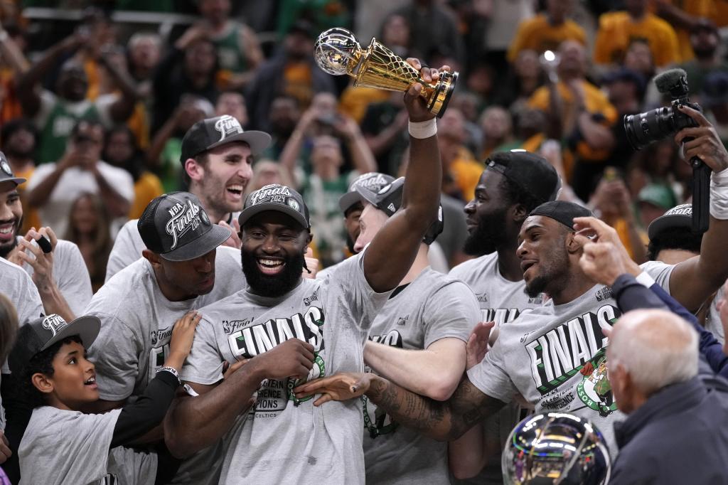 Jaylen Brown with the MVP trophy at the recent NBA Finals.