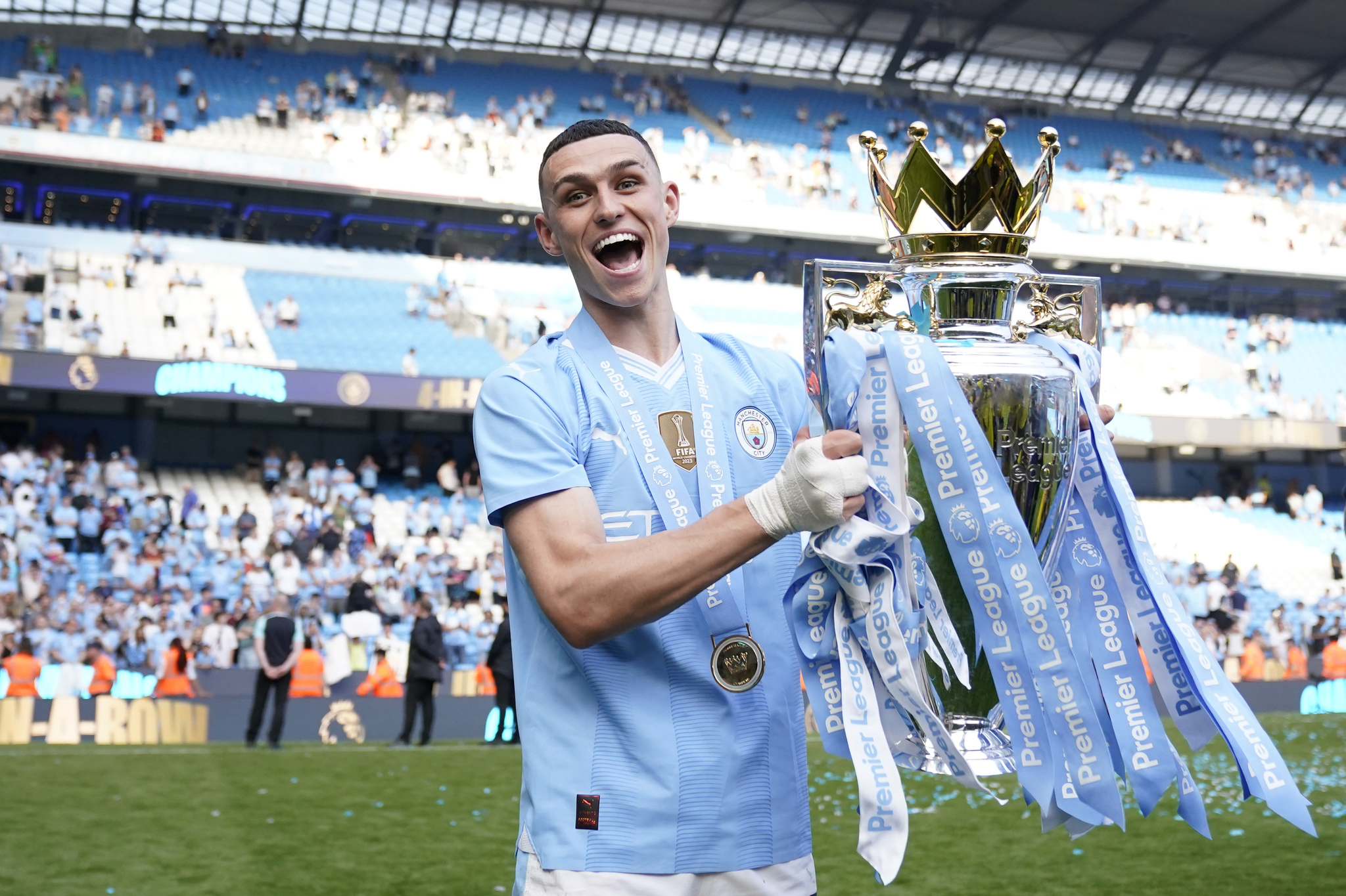 Phil Foden, lifting the Premier League