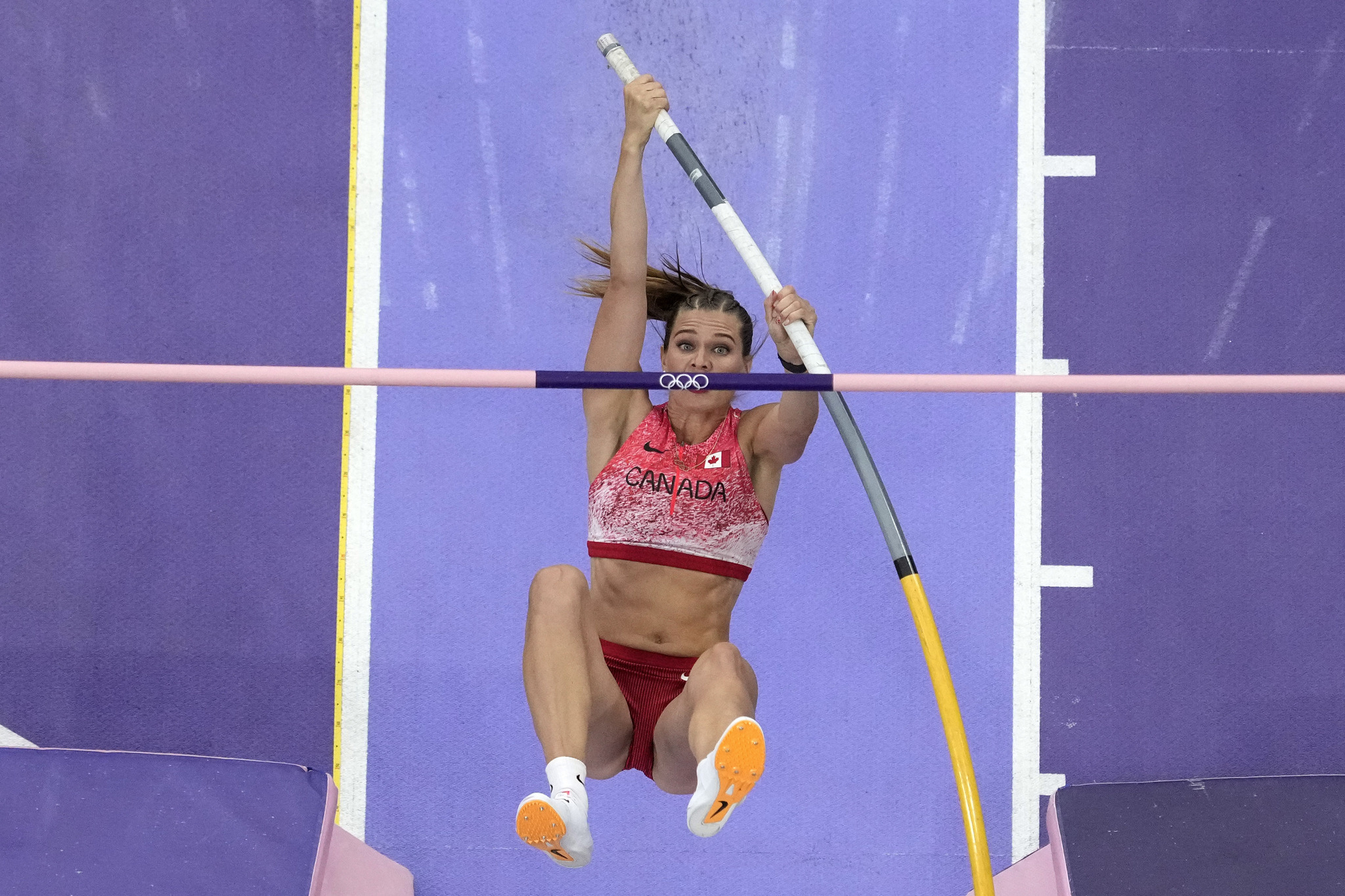 Alicia Newman performs the jump that allowed her to win the bronze medal on an equal footing