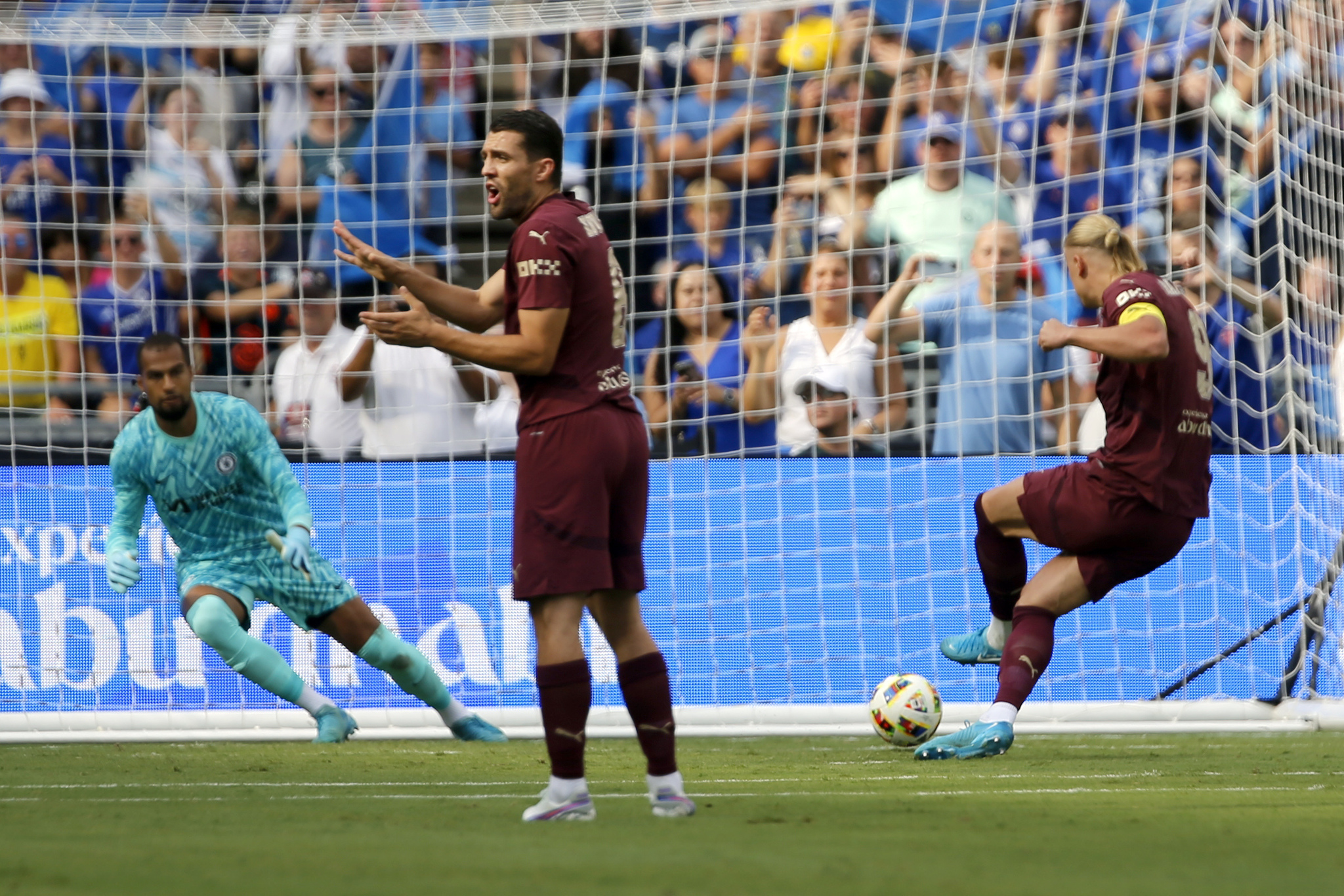 Haaland converts a penalty kick against Chelsea