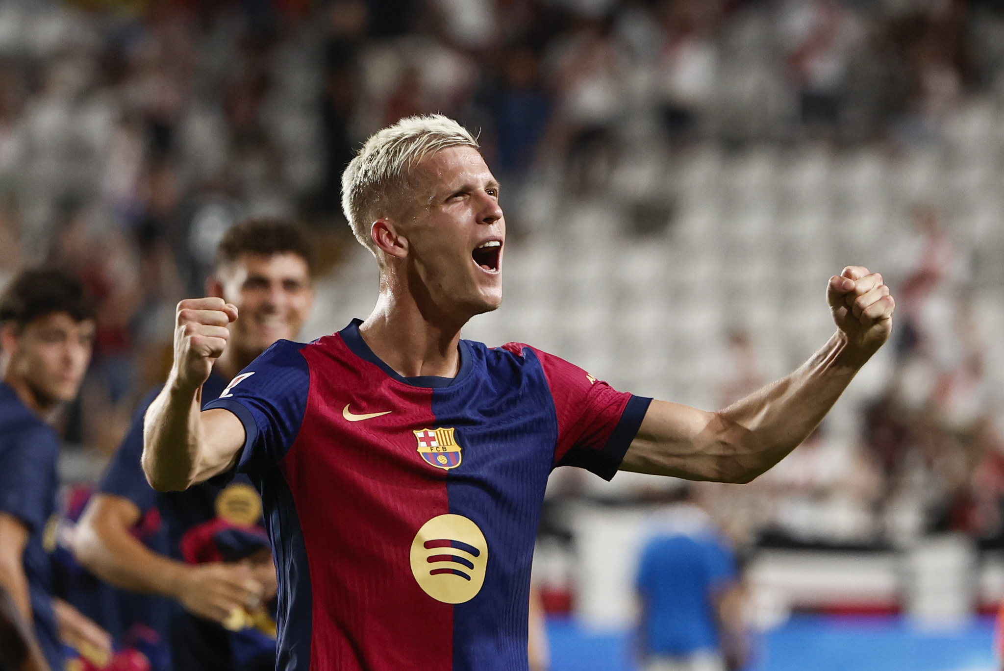 Dani Olmo celebrates his goal against Rayo