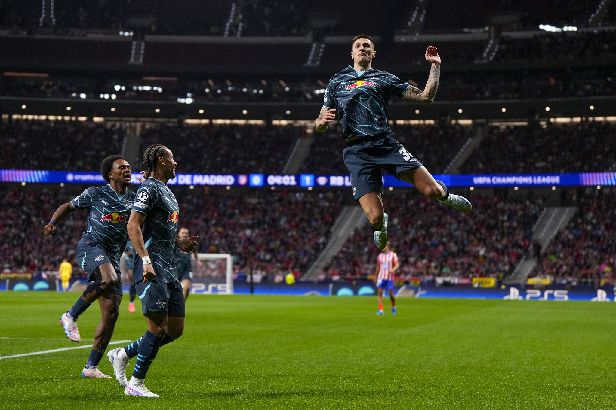 Cisco celebrates his goal against Atletico Madrid