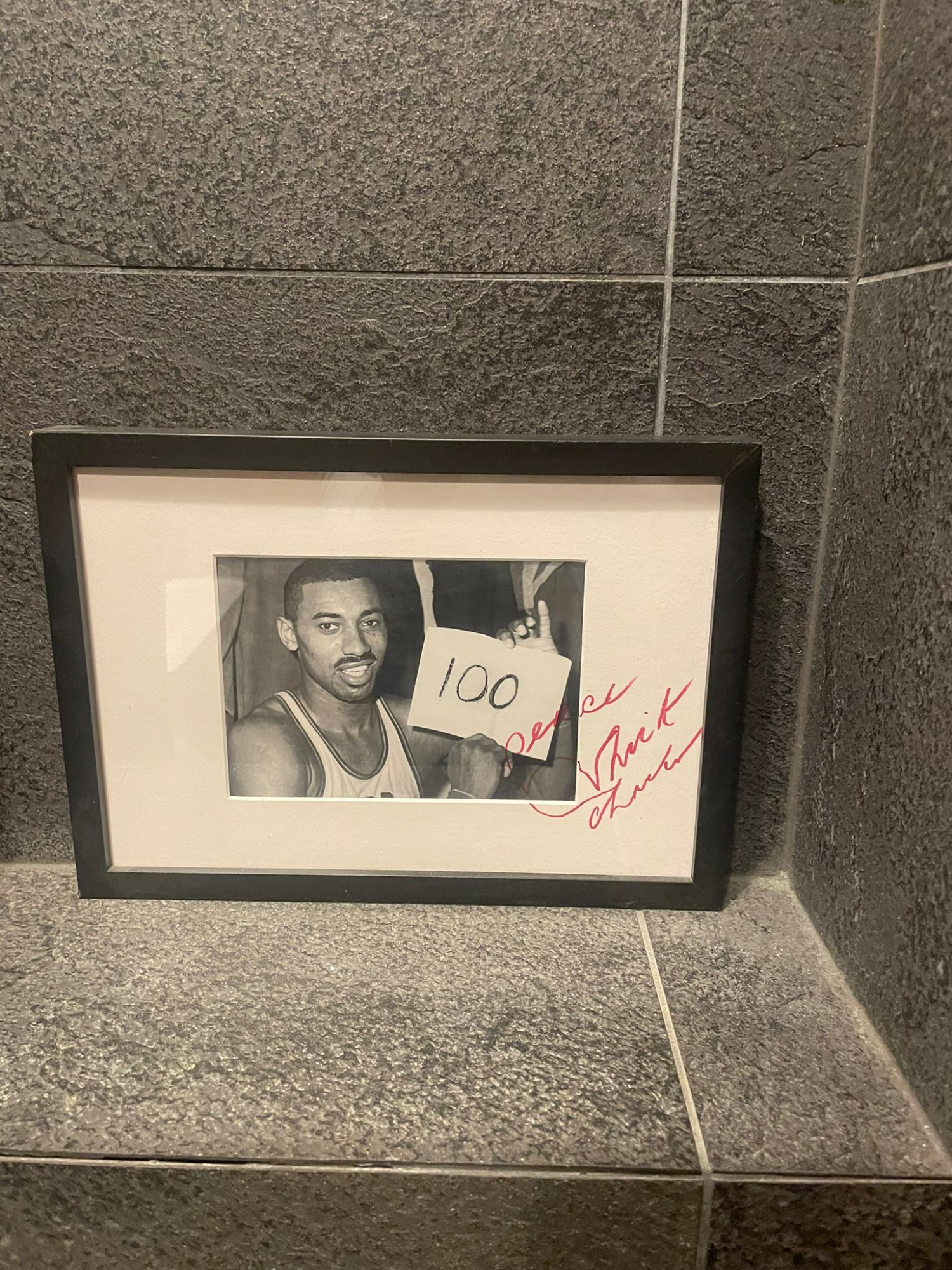 Photo of the frame located in the bathroom.