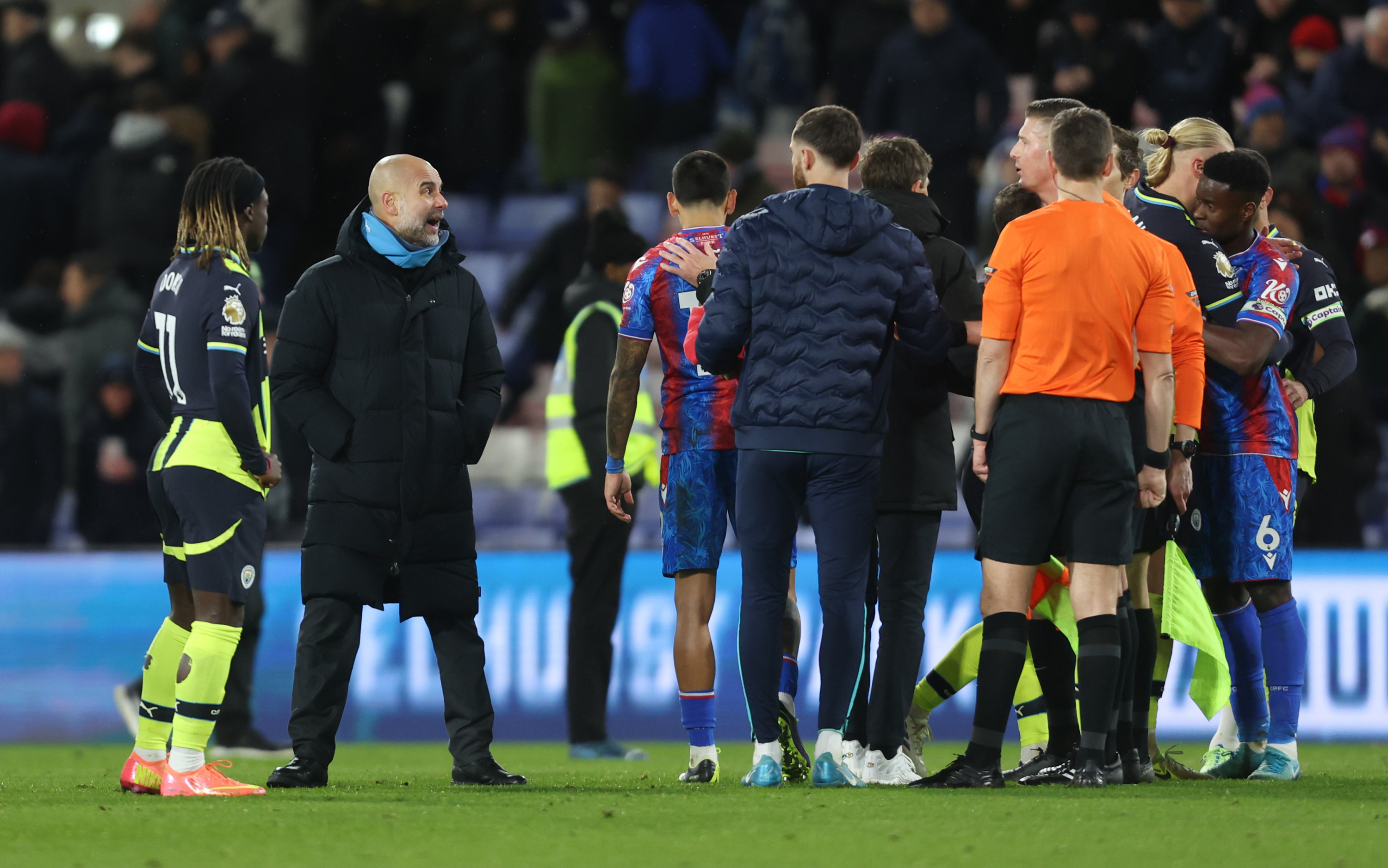 Guardiola persistently protests to the referees.